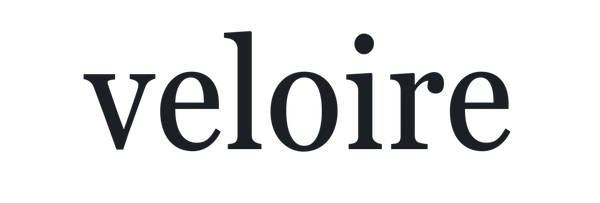 The word 'veloire' in a dark charcoal serif typeface, centered on a solid white background.